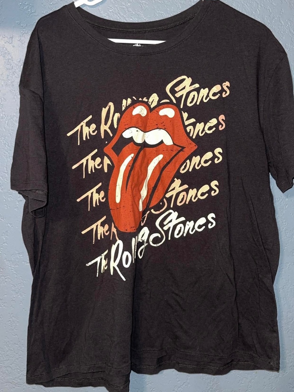 the Rolling Stones Black Tee with Red & Cream Tongue Graphic